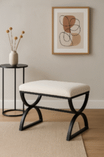 Boucle. Footstool. Stool. White. Black. Matte. Texture. Chair. Seating. Luxury. Plush. Chic. Home. Decor. Furniture. Living. Dining. Bedroom. Room. Comfort. Upholstery. Design. Versatile.