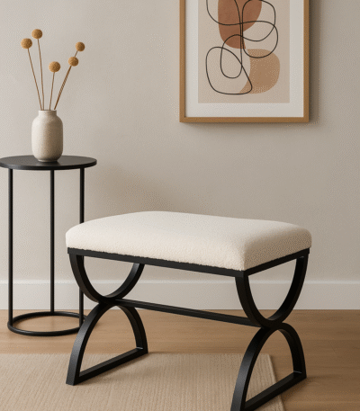 Boucle. Footstool. Stool. White. Black. Matte. Texture. Chair. Seating. Luxury. Plush. Chic. Home. Decor. Furniture. Living. Dining. Bedroom. Room. Comfort. Upholstery. Design. Versatile.