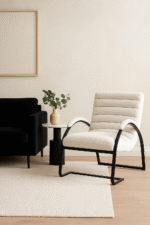 Boucle. Lounge. Chair. White. Black. Matte. Texture. Chair. Seating. Luxury. Plush. Chic. Home. Decor. Furniture. Living. Dining. Bedroom. Room. Comfort. Upholstery. Design. Versatile.