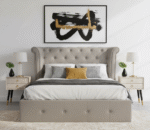 Hudson King Size Grey Velvet Ottoman Bed. Brushed velvet upholstered head slat. Diamond pattern tufting. Elegant visual appeal. Rolled top. Wingback style. Renewable pinewood frame. Long-lasting durability. Padding across all sides. Aesthetically pleasing look. Natural wood frame. Brushed velvet upholstery. Luxe design. Button tufted headboard. Wingback style roll sides. Bed. Bedroom. Furniture. Home. Storage. Durable. Stylish. Comfortable. Functional. High-quality materials. Practical. Sophisticated. Modern classic. Statement piece.