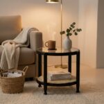 Manila Side Table. Modern minimalism. Black elm wood frame. Clean lines. Rounded corners. Clear glass top. Natural cane open weave. Organic appeal. Sustainable frame. Natural rattan weave. Organic simplicity. Mid-century modern. Stylish. Functional. Living room. Hallway. Bedroom. Durable. Elegant design.