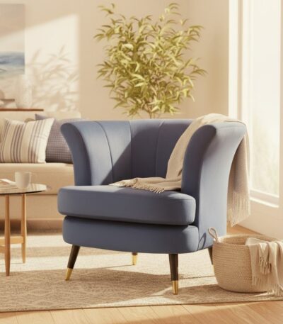 Emilia velvet chair. Scalloped accent chair. Velvet upholstery. Luxe chair. Gold finish legs. Black wood legs. Blue velvet. Pink velvet. Grey velvet. Mink velvet. Plush cushioning. Boutique style. Contemporary chair. Stylish seating. Home furniture. Living room chair. Decorative chair. Elegant furniture. Modern accent chair. Trendy home decor. Comfortable seating. Luxury chair. Designer chair.