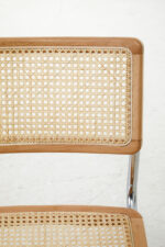 Sustainable elm wood frame. Stainless steel cantilevered frame. Natural rattan weave. Organic simplicity. Mid-century modern. Sleek design. Contemporary elegance. Durable. Comfortable. Stylish. Functional. Dining room. Modern. Rustic charm. Versatile. Long-lasting. Timeless aesthetic. Eco-friendly. Sturdy. High-quality. Furniture. Home. Kitchen. Sustainable elm wood frame. Stainless steel cantilevered frame. Natural rattan weave. Organic simplicity. Mid-century modern. Sleek design. Contemporary elegance. Durable. Comfortable. Stylish. Functional. Dining room. Modern. Rustic charm. Versatile. Long-lasting. Timeless aesthetic. Eco-friendly. Sturdy. High-quality. Furniture. Home. Kitchen. Dining. Chair.