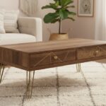 Talia Coffee Table. Mid-century modern coffee table. Rustic coffee table. Wood veneer. Hairpin legs. Two drawer coffee table. Ample storage. Living room furniture. Boutique coffee table. Modern wood table. Retro style. Stylish coffee table. Compact storage. Brown coffee table. Natural wood tones. Home furniture. Functional coffee table. Storage solution. Minimalist coffee table. Wooden table with drawers. Contemporary living room. Vintage inspired furniture.