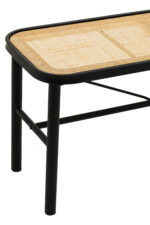 Dakota bench. Natural rattan bench. Black metal frame. Handwoven rattan. Minimalist bench. Organic texture. Sleek design. Home furniture. Natural living. Modern bench. Living room furniture. Rectangular bench. Stylish seating. Eco-friendly furniture. Durable bench.