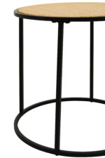 Dakota side table. Round side table. Natural rattan. Hand-woven rattan. Organic texture. Black metal legs. Sleek design. Minimalist furniture. Natural living. Home decor. Living room furniture. Modern side table. Contemporary furniture. Black finish. Rattan furniture. Lightweight table.