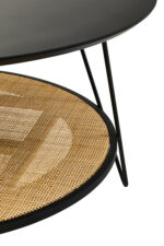 Dakota Coffee Table. Black metal table. Natural rattan shelf. Hairpin legs. Round coffee table. Storage shelf. Organic texture. Modern furniture. Natural living. Minimalist design. Home furniture. Living room table. Durable coffee table. Contemporary style. Black furniture. Rattan furniture. Sleek design.