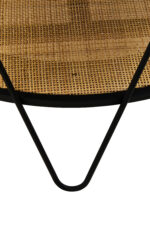 Dakota Coffee Table. Black metal table. Natural rattan shelf. Hairpin legs. Round coffee table. Storage shelf. Organic texture. Modern furniture. Natural living. Minimalist design. Home furniture. Living room table. Durable coffee table. Contemporary style. Black furniture. Rattan furniture. Sleek design.