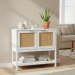 home. furniture. side cabinet. storage cabinet. wooden cabinet. white cabinet. rattan furniture. natural rattan. compact storage. modern cabinet. white sideboard. boho furniture. living room storage. hallway cabinet. entryway furniture. small storage unit. contemporary design. earthy decor. painted wood. minimalist style. two-door cabinet. versatile storage. shelf unit. natural accents. sustainable materials. white and rattan. scandi style.