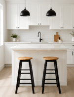 Bar stool. Kitchen stool. Wooden bar stool. Natural wood. A-frame legs. Black. White. Grey. Modern rustic furniture. Home furniture. Seating. Counter stool. Bar seating. Minimalist furniture. Scandi style. Farmhouse bar stool. Breakfast bar chair. Footrest stool. Compact bar stool. Solid wood stool. Contemporary seating.