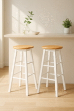 Bar stool. Kitchen stool. Wooden bar stool. Natural wood. A-frame legs. Black. White. Grey. Modern rustic furniture. Home furniture. Seating. Counter stool. Bar seating. Minimalist furniture. Scandi style. Farmhouse bar stool. Breakfast bar chair. Footrest stool. Compact bar stool. Solid wood stool. Contemporary seating.