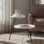 side table. 2 tier table. iron side table. minimalist furniture. black iron legs. white table. grey table. contemporary table. modern home décor. compact table. living room furniture. bedroom furniture. monochrome furniture. stylish side table. metal frame table. small space furniture. home accessories. interior design. functional furniture. sleek furniture.