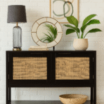 Nero Side Cabinet. Black furniture. Wood cabinet. Natural rattan panels. Storage solution. Two closed shelves. Undershelf. Modern home furniture. Warm aesthetic. Earthy tones. Contemporary design. Living room storage. Bedroom furniture. Stylish cabinet. Practical storage. Minimalist cabinet. Durable wood. Eco-friendly materials. Home organisation.