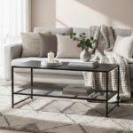 Axel Coffee Table. Grey coffee table. Black coffee table. Industrial coffee table. Powder-coated metal. Open mesh shelf. Space-saving furniture. Living room table. Modern design. Minimalist coffee table. Home furniture. Durable metal table. Contemporary style. Functional coffee table.