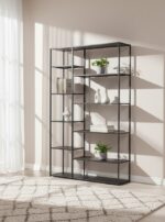 Axel shelf unit. Multi-level shelving. Metal shelf unit. Grey powder coated metal. Industrial shelf unit. Open shelving. Home storage furniture. Modern shelving unit. Minimalist shelf design. Large storage unit. Organiser shelf. Living room shelf. Office storage shelf. Display shelves. Industrial home decor. Contemporary storage solution. Grey metal furniture. Modern open shelf unit. Multi-purpose shelf unit. Sleek metal shelving.