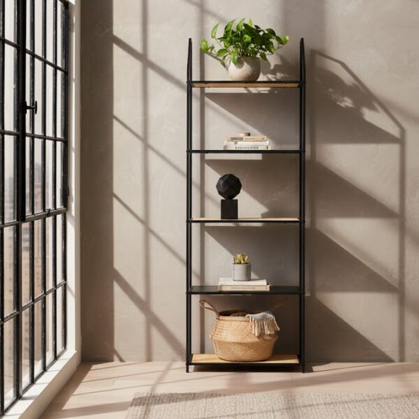 Dakota shelf unit. 5 tier shelf. Black metal shelf. Natural rattan shelves. Open storage. Sturdy metal frame. Home storage. Living room furniture. Modern shelves. Natural living. Contemporary furniture. Black shelving unit. Versatile storage. Decorative shelves. Home organization. Rustic style. Minimalist shelves. Bookcase. Display shelves. Home decor.