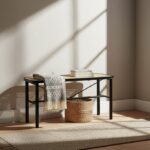 Dakota bench. Natural rattan bench. Black metal frame. Handwoven rattan. Minimalist bench. Organic texture. Sleek design. Home furniture. Natural living. Modern bench. Living room furniture. Rectangular bench. Stylish seating. Eco-friendly furniture. Durable bench.