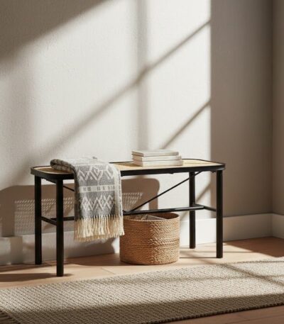 Dakota bench. Natural rattan bench. Black metal frame. Handwoven rattan. Minimalist bench. Organic texture. Sleek design. Home furniture. Natural living. Modern bench. Living room furniture. Rectangular bench. Stylish seating. Eco-friendly furniture. Durable bench.