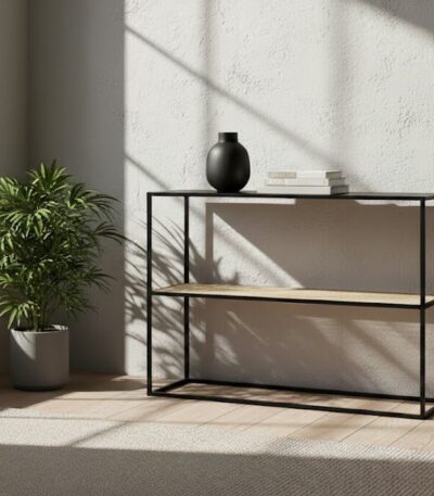Dakota console table. Black metal console. Natural rattan shelf. Minimalist furniture. Modern console table. Storage furniture. Natural living. Home decor. Sleek design. Contemporary console. Black and rattan. Living room furniture. Entryway table. Small console table. Durable metal frame.