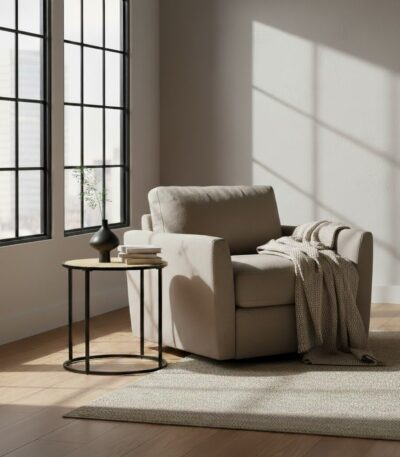 Dakota side table. Round side table. Natural rattan. Hand-woven rattan. Organic texture. Black metal legs. Sleek design. Minimalist furniture. Natural living. Home decor. Living room furniture. Modern side table. Contemporary furniture. Black finish. Rattan furniture. Lightweight table.