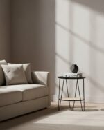 dakota side table. black metal side table. side table with rattan shelf. hairpin leg table. small round table. modern side table. boho side table. minimalist side table. rattan furniture. black and natural table. living room side table. compact accent table. metal and rattan table. natural living furniture. decorative side table. small storage table. round top side table. coffee table alternative. scandi boho furniture. home furniture.