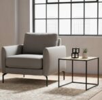 Dakota. Side table. Natural rattan. Hand-woven. Square webbing. Black metal frame. Minimalist furniture. Natural living. Home décor. Living room. Organic texture. Sleek design. Rustic style. Eco-friendly furniture. Small table. Accent table. Modern rustic. Sustainable materials.