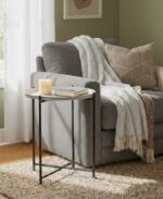 home. furniture. side table. modern side table. minimalist furniture. tray table. accent table. round top table. black iron legs. lattice base. contemporary style. white tray. grey tray. small table. living room furniture. stylish side table. metal table. modern home décor. interior design. compact table. Scandinavian style. functional furniture. decorative table. sofa side table. bedroom side table. entryway furniture.