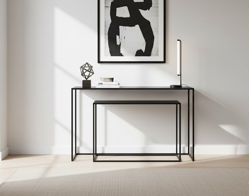 Valento Set Of 2 Console Tables Valento Console Tables. Console Table Set. Black Console Tables. Gold Console Tables. Modern Console Tables. Minimalist Console Tables. Mirrored Console Tables. Iron Console Tables. Tempered Glass Console Tables. Living Room Furniture. Hallway Furniture. Home Entryway Tables. Luxe Console Tables. Small Space Furniture. Contemporary Home Decor. Stylish Side Tables. Modern Entry Tables. Sleek Furniture Design. Narrow Console Tables. Valento Collection. Home Furniture. Accent Tables. Metal Frame Tables.