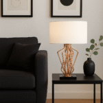 Stella Table Lamp. Home lighting. Black fabric shade. White fabric shade. Bronze metal frame. Black marble base. Handcrafted lamp. Contemporary design. Modern lighting. Decorative lamp. Table lamp. Living room lighting. Bedroom lighting. Stylish lamp. Elegant lighting. Durable lamp. Indoor lighting. Sleek design. Luxury lighting. Black and white shades. Bronze finish.