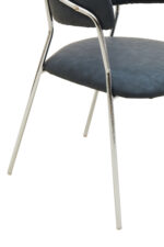 Taryn Leather Dining Chair. Grey leather dining chair. Modern dining chair. Chrome leg dining chair. Contemporary leather chair. Padded dining chair. Tufted backrest chair. Minimalist dining furniture. Ergonomic dining chair. Stylish grey chair. Luxury dining seating. Metal frame dining chair. Modern kitchen chair. Easy clean leather chair. Industrial dining chair. Sleek dining chair. Compact dining chair. Modern home furniture. Comfortable dining chair. Dark grey upholstered chair.