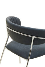 Taryn Leather Dining Chair. Grey leather dining chair. Modern dining chair. Chrome leg dining chair. Contemporary leather chair. Padded dining chair. Tufted backrest chair. Minimalist dining furniture. Ergonomic dining chair. Stylish grey chair. Luxury dining seating. Metal frame dining chair. Modern kitchen chair. Easy clean leather chair. Industrial dining chair. Sleek dining chair. Compact dining chair. Modern home furniture. Comfortable dining chair. Dark grey upholstered chair.