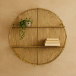 Elio Round Wall Shelf. Gold Wall Shelf. Black Wall Shelf. Round Shelf. Wall Decor. Modern Wall Shelf. Industrial Wall Shelf. 100% Iron Shelf. Wire Wall Shelf. Decorative Wall Art. Contemporary Wall Shelf. Living Room Decor. Bedroom Wall Shelf. Office Wall Decor. Floating Shelf. Wall Display Unit. Home Accessories. Metal Wall Shelf. Minimalist Wall Shelf. Modern Home Decor. Accent Shelf. Gold and Black Wall Art. Stylish Storage. Interior Wall Styling.