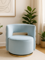 Esme Velvet Swivel Chair. Velvet Chair. Light Blue Chair. Mink Chair. Pink Chair. Mid-Century Modern Chair. Upholstered Chair. Thick Foam Cushioning. Buttoned Back Chair. 360 Degree Swivel Chair. Sturdy Rotating Base. Vintage Style Chair. Stylish Accent Chair. Home Furniture. Living Room Chair. Bedroom Chair. Office Chair. Compact Seating. Comfortable Chair. Soft Velvet Upholstery. Decorative Texture. Modern Home Decor.