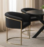 Veda Velvet Dining Chair. black velvet chair. gold frame chair. mink velvet chair. black frame chair. modern velvet chair. upholstered dining chair. plush velvet seating. sleek dining chair. compact dining chair. comfortable dining chair. stylish dining furniture. contemporary dining chair. luxury velvet chair. velvet accent chair. living room furniture. dining room furniture. modern home furniture. metal frame chair. velvet chair for small spaces. elegant velvet chair.