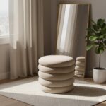 melina velvet round footstool. velvet circular ottoman. modern round footstool. plush velvet stool. elegant velvet ottoman. soft velvet footrest. small velvet accent stool. compact velvet ottoman. contemporary velvet stool. round padded footstool. velvet upholstered stool. cosy round velvet seat. stylish home footstool. velvet footstool for living room. luxury round velvet ottoman. decorative velvet footrest. round stool with velvet fabric. velvet pouffe footstool. cushioned round ottoman. chic velvet decor stool. grey. cream. mink. vanity. seat. stool.