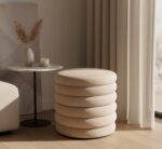 melina velvet round footstool. velvet circular ottoman. modern round footstool. plush velvet stool. elegant velvet ottoman. soft velvet footrest. small velvet accent stool. compact velvet ottoman. contemporary velvet stool. round padded footstool. velvet upholstered stool. cosy round velvet seat. stylish home footstool. velvet footstool for living room. luxury round velvet ottoman. decorative velvet footrest. round stool with velvet fabric. velvet pouffe footstool. cushioned round ottoman. chic velvet decor stool. grey. cream. mink. vanity. seat. stool.