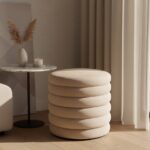 melina velvet round footstool. velvet circular ottoman. modern round footstool. plush velvet stool. elegant velvet ottoman. soft velvet footrest. small velvet accent stool. compact velvet ottoman. contemporary velvet stool. round padded footstool. velvet upholstered stool. cosy round velvet seat. stylish home footstool. velvet footstool for living room. luxury round velvet ottoman. decorative velvet footrest. round stool with velvet fabric. velvet pouffe footstool. cushioned round ottoman. chic velvet decor stool. grey. cream. mink. vanity. seat. stool.