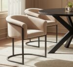 Veda Velvet Dining Chair. black velvet chair. gold frame chair. mink velvet chair. black frame chair. modern velvet chair. upholstered dining chair. plush velvet seating. sleek dining chair. compact dining chair. comfortable dining chair. stylish dining furniture. contemporary dining chair. luxury velvet chair. velvet accent chair. living room furniture. dining room furniture. modern home furniture. metal frame chair. velvet chair for small spaces. elegant velvet chair.