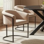 Veda Velvet Dining Chair. black velvet chair. gold frame chair. mink velvet chair. black frame chair. modern velvet chair. upholstered dining chair. plush velvet seating. sleek dining chair. compact dining chair. comfortable dining chair. stylish dining furniture. contemporary dining chair. luxury velvet chair. velvet accent chair. living room furniture. dining room furniture. modern home furniture. metal frame chair. velvet chair for small spaces. elegant velvet chair.