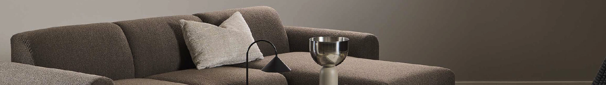 Sofas. Living room. Comfort. Premium materials. Contemporary. Classic. Modern. Leather. Fabric. Upholstery. Wooden frame. Home decor. Sectional. Recliner. Sleeper sofas. Versatile. Seating. Cosy. Haven. Style. Functionality.