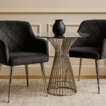 velvet dining chair. modern dining chair. padded seat. cocoon armrests. quilted backrest. gold finish legs. chrome finish legs. grey dining chair. aqua blue chair. black velvet chair. mid-century modern furniture. stylish dining seating. home furniture. dining room chair. luxury dining chair. contemporary dining chair. durable dining chair. compact dining chair. living space furniture. elegant dining chair. comfortable dining seating.