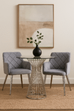 velvet dining chair. modern dining chair. padded seat. cocoon armrests. quilted backrest. gold finish legs. chrome finish legs. grey dining chair. aqua blue chair. black velvet chair. mid-century modern furniture. stylish dining seating. home furniture. dining room chair. luxury dining chair. contemporary dining chair. durable dining chair. compact dining chair. living space furniture. elegant dining chair. comfortable dining seating.