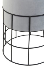 Vey Cage Frame Stool. Grey Velvet Stool. Black Metal Base. Grid Wireframe Stool. Industrial Side Stool. Modern Accent Stool. Contemporary Seating. Minimalist Stool. Living Room Stool. Bedroom Stool. Office Stool. Plush Velvet Stool. Sleek Industrial Furniture. Compact Seating Option. Decorative Stool. Modern Home Accessory. Urban Style Stool. Functional Accent Furniture. Designer Velvet Stool. Stylish Seating.