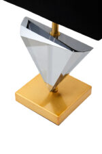 Alina Smoked Crystal Table Lamp. Triangular Crystal Lamp. Gold Metal Lamp. Black Shade Lamp. Geometric Table Lamp. Modern Accent Lamp. Luxury Table Lamp. Contemporary Lighting. Sleek Table Lamp. Living Room Lamp. Bedroom Lamp. Desk Lamp. Boutique Style Lamp. Designer Table Lamp. Sculptural Lamp. Ambient Lighting. Modern Home Accessory. Minimalist Lamp. Statement Table Lamp. Elegant Table Lamp.