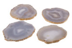 Wren Agata Coasters. Grey Agate Coasters. Gold Edge Coasters. Natural Stone Coasters. Luxury Drink Coasters. Modern Tableware. Elegant Home Décor. Set of Four Coasters. Luxe Accent Coasters. Contemporary Dining Accessories. Stylish Coffee Table Coasters. Designer Coaster Set. Marble Effect Coasters.