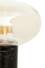 Vega Table Lamp. Black Marble Table Lamp. Gold Cognac Glass Lamp. Cylindrical Marble Lamp. Modern Table Lamp. Luxury Home Lighting. Boutique Style Lamp. Ambient Lighting Feature. Contemporary Table Lamp. Minimalist Desk Lamp. Elegant Side Table Lamp. Statement Home Lighting. Designer Table Lamp. Stylish Living Room Lamp. Durable Accent Lamp.