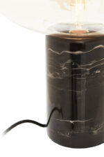 Vega Table Lamp. Black Marble Table Lamp. Gold Cognac Glass Lamp. Cylindrical Marble Lamp. Modern Table Lamp. Luxury Home Lighting. Boutique Style Lamp. Ambient Lighting Feature. Contemporary Table Lamp. Minimalist Desk Lamp. Elegant Side Table Lamp. Statement Home Lighting. Designer Table Lamp. Stylish Living Room Lamp. Durable Accent Lamp.