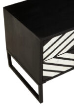 Casia Bedside Table. Bone inlay bedside table. White bone inlay furniture. Black wood base. Floral drawer grips. Modern nightstand. Handcrafted side table. Contemporary bedroom furniture. Global-inspired décor. Luxury accent table.