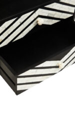 Casia Bedside Table. Bone inlay bedside table. White bone inlay furniture. Black wood base. Floral drawer grips. Modern nightstand. Handcrafted side table. Contemporary bedroom furniture. Global-inspired décor. Luxury accent table.