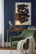 Azala Table Lamp. Matte Gold Table Lamp. Black Linen Shade Lamp. Contemporary Table Lamp. Modern Home Lighting. Sleek Metal Frame Lamp. Sledge Base Lamp. Side Table Lamp. Desk Lamp. Living Room Lamp. Bedroom Lamp. Boutique Style Lamp. Minimalist Lighting Feature. Elegant Home Accent Lamp. Functional Ambient Lighting.